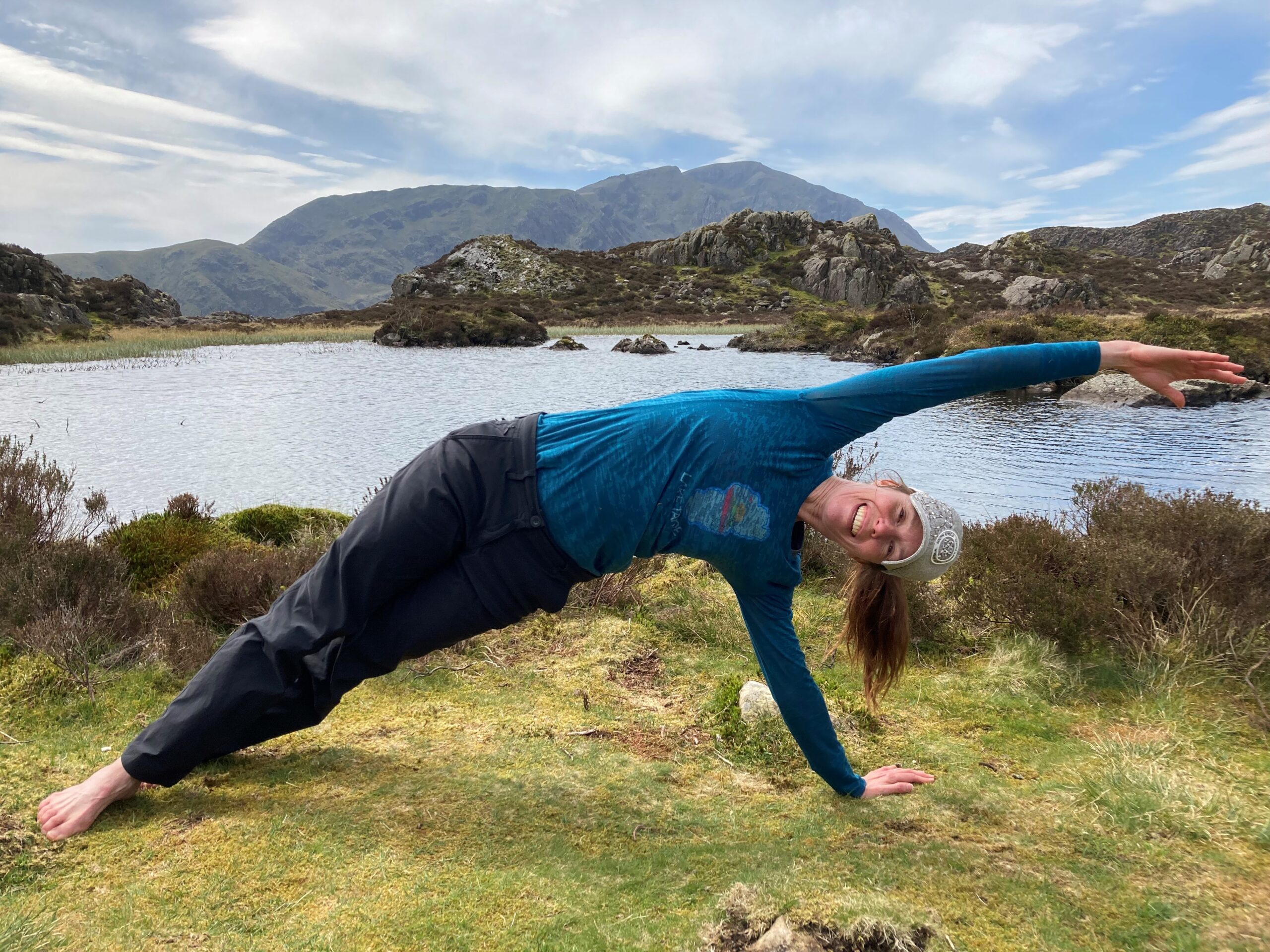 Pilates teacher demonstrating an exercise which helps build spine strength